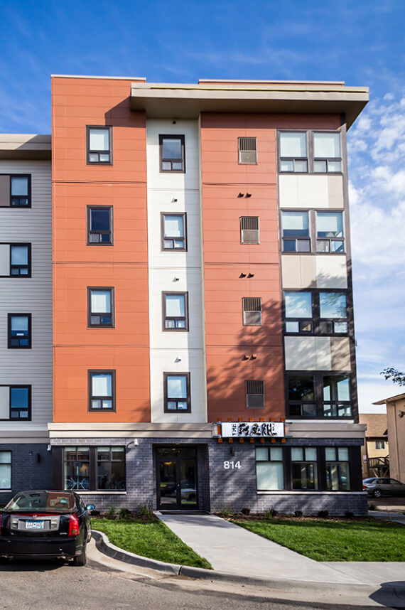 the front of an apartment building